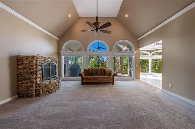 a bathroom with a glass shower door and a sink