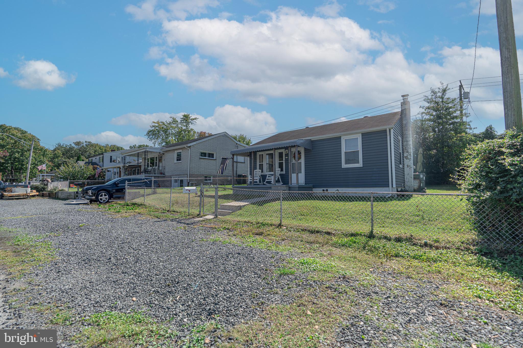53 Chandelle Road Baltimore, MD 21220 - Photo 13 of 15 a view of a house with a backyard and swimming pool