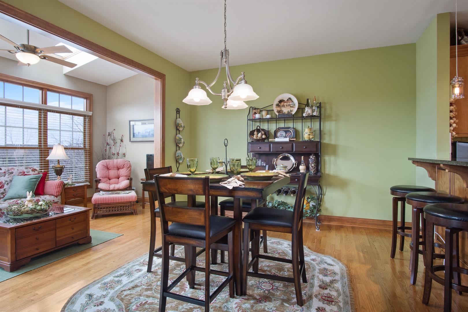 3705 Ridge Pointe Drive Geneva, IL 60134 - Photo 14 of 35 a view of a dining room with furniture and chandelier