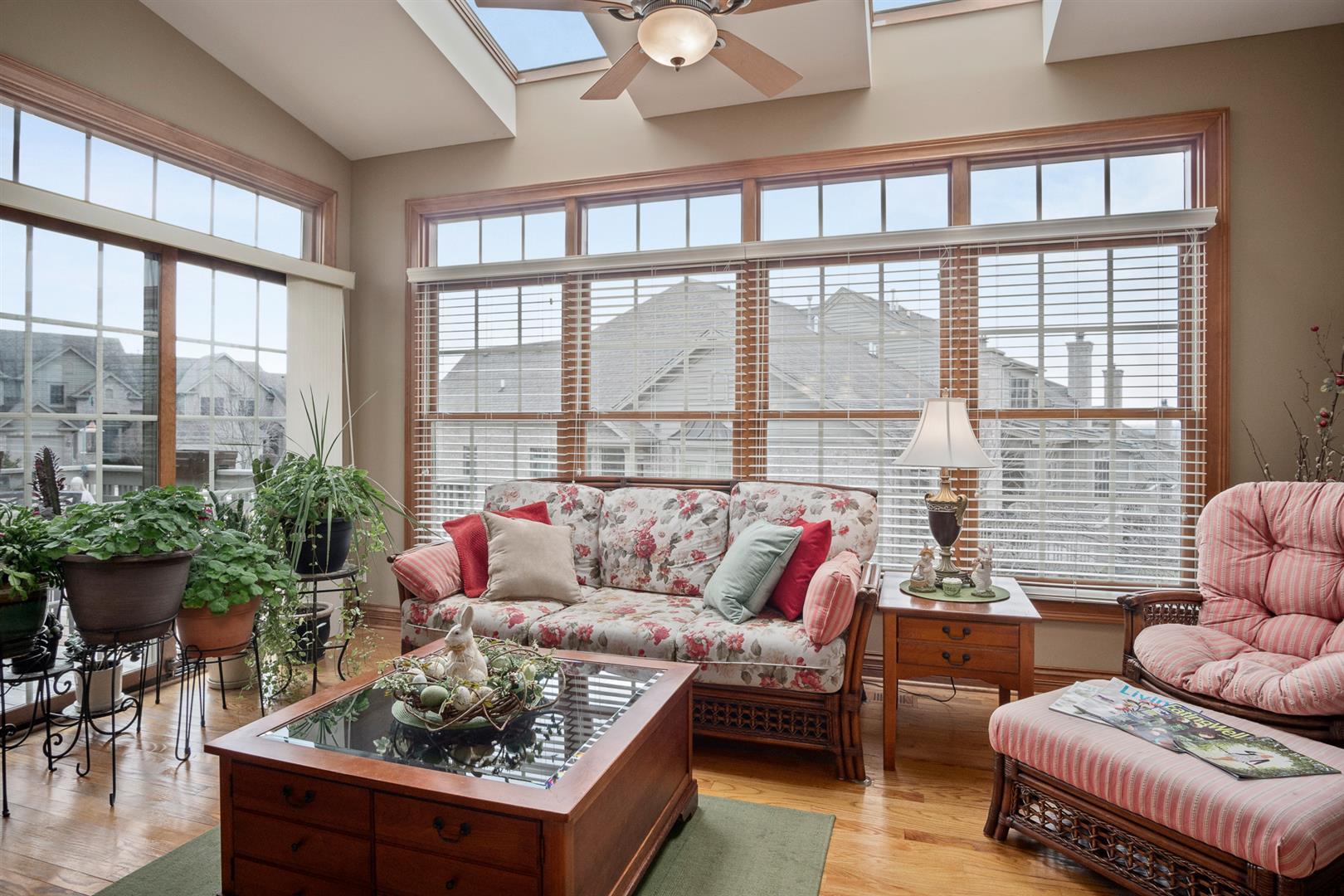 3705 Ridge Pointe Drive Geneva, IL 60134 - Photo 16 of 35 a living room with furniture and a large window