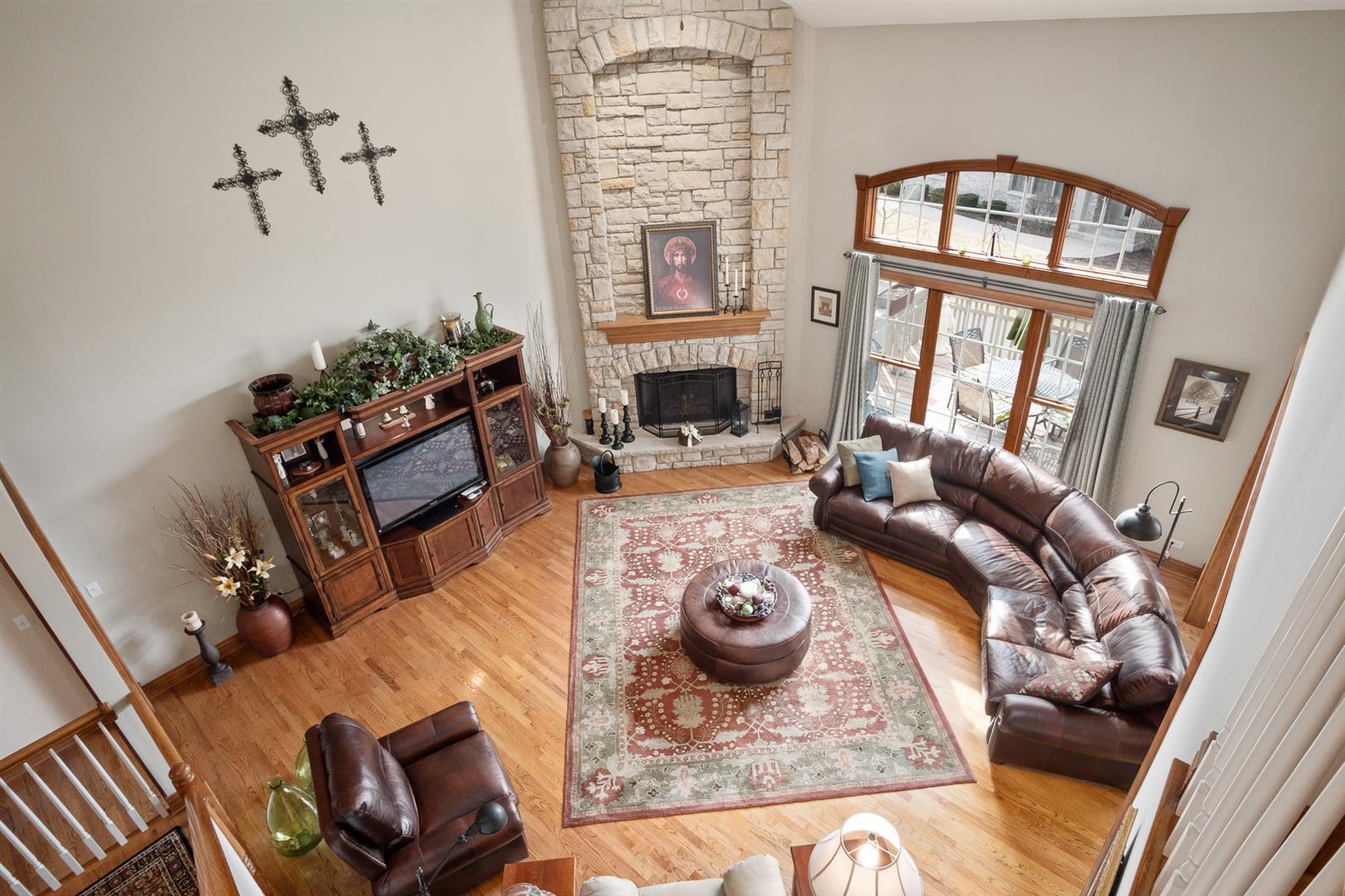 3705 Ridge Pointe Drive Geneva, IL 60134 - Photo 17 of 35 a living room with furniture and a fireplace