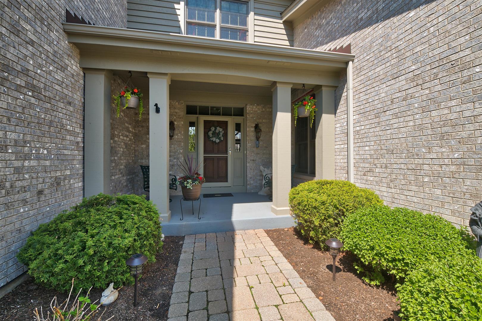 3705 Ridge Pointe Drive Geneva, IL 60134 - Photo 3 of 35 a view of a house with potted plants