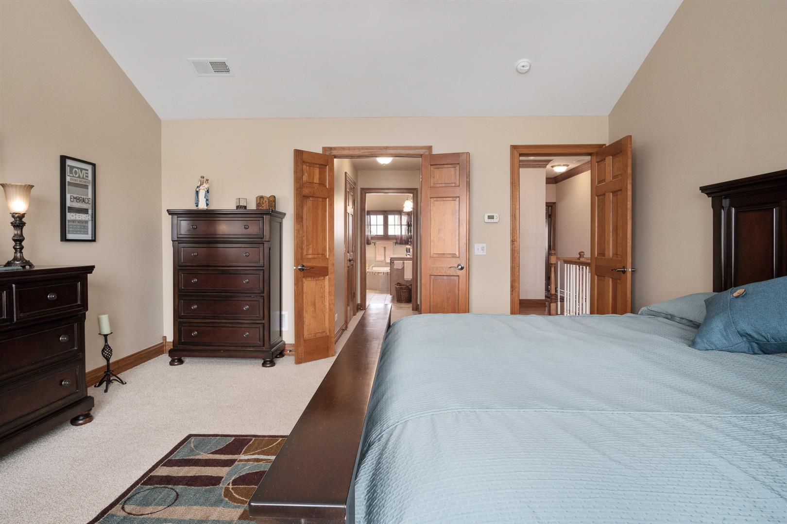 3705 Ridge Pointe Drive Geneva, IL 60134 - Photo 21 of 35 a room with a bed and furniture
