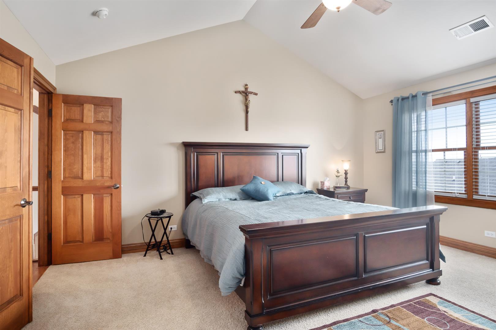 3705 Ridge Pointe Drive Geneva, IL 60134 - Photo 22 of 35 a bedroom with a bed and a window