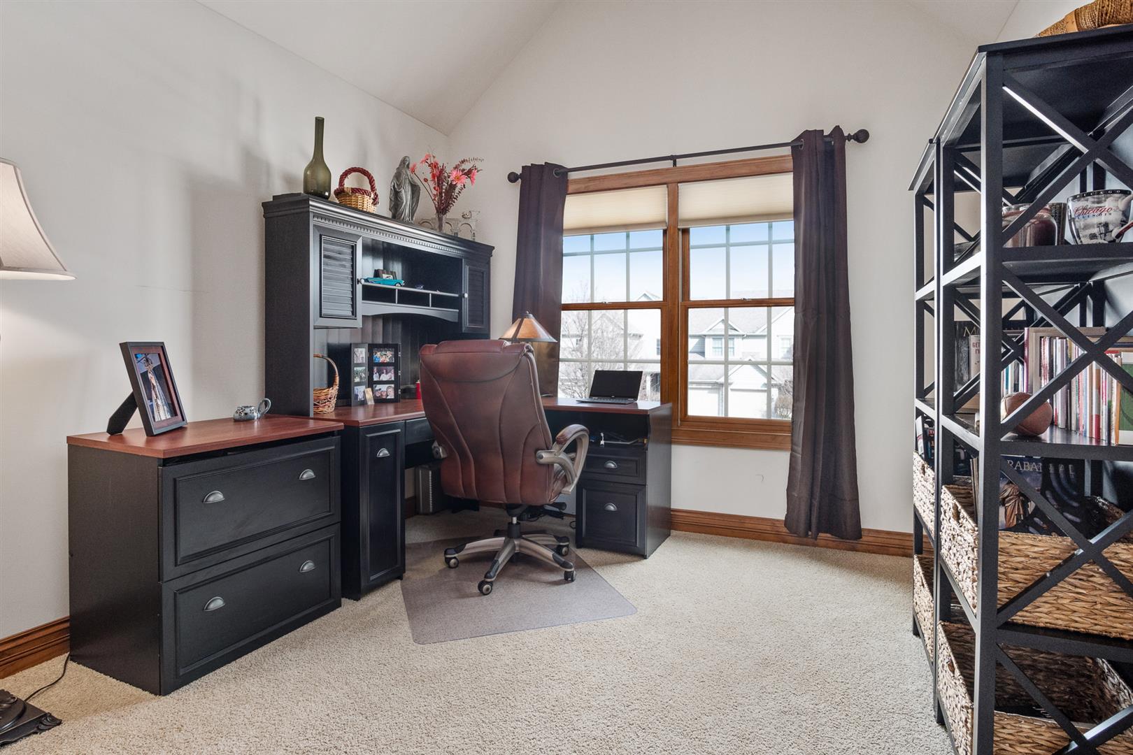 3705 Ridge Pointe Drive Geneva, IL 60134 - Photo 26 of 35 a view of workspace with furniture cabinet and a window