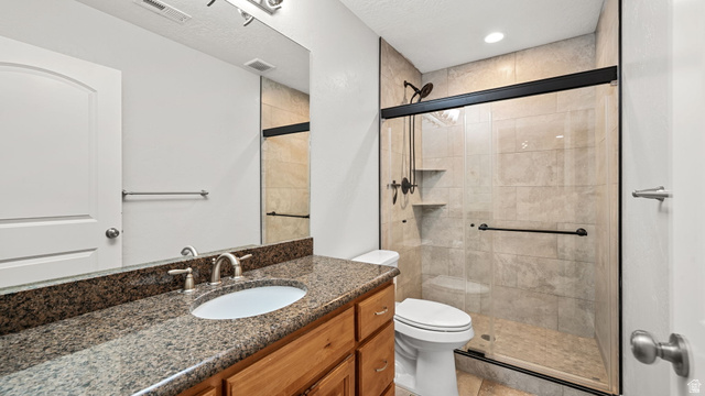 45 North 970 W Street Orem, UT 84057 - Photo 31 of 45 Bathroom featuring vanity, a shower stall, and recessed lighting