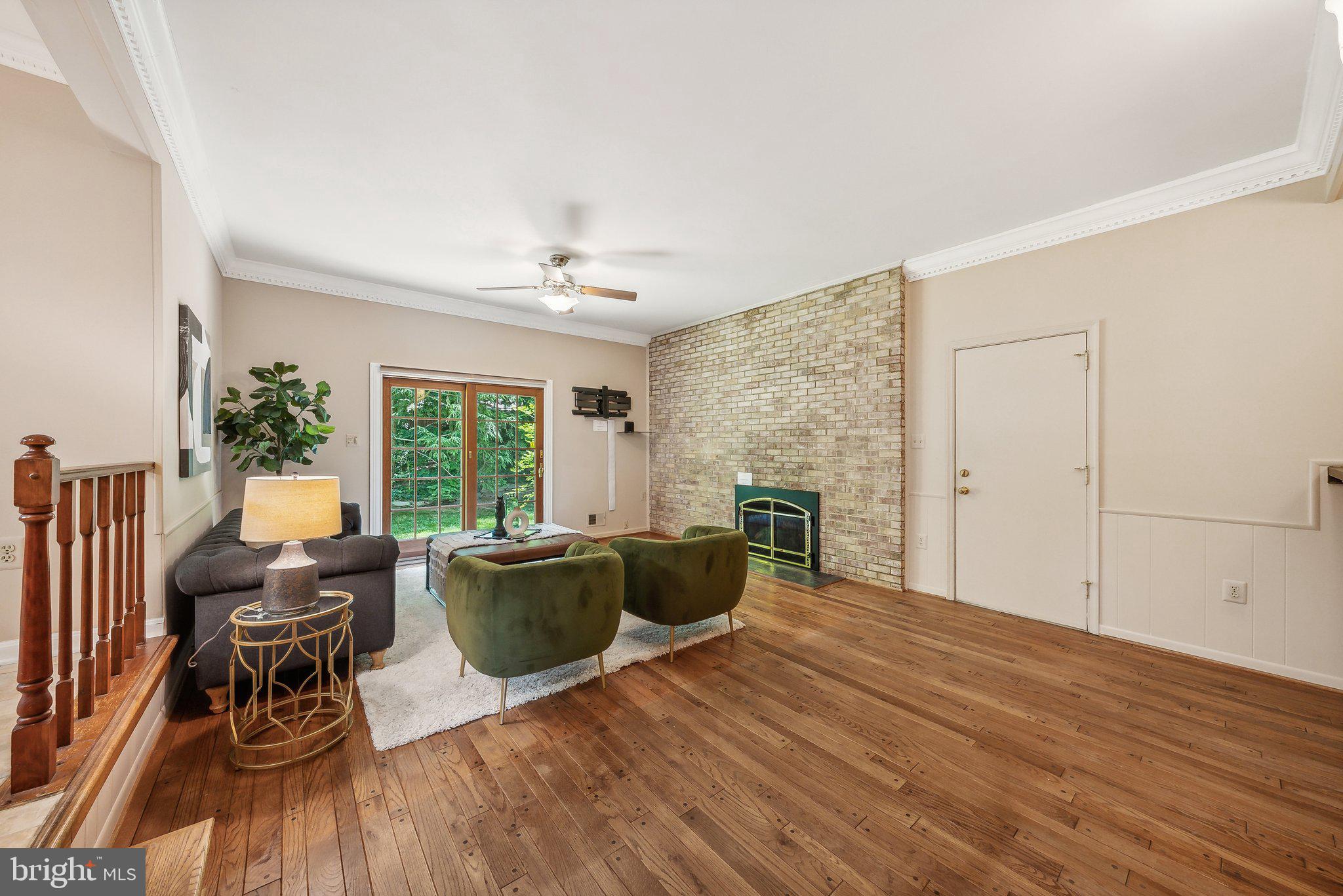 7801 Lowmoor Court Springfield, VA 22153 - Photo 10 of 41 Family room fireplace with gas insert