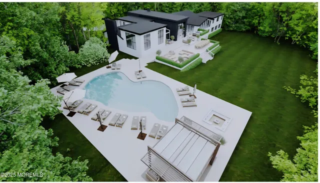 an aerial view of a house with outdoor space and trees all around