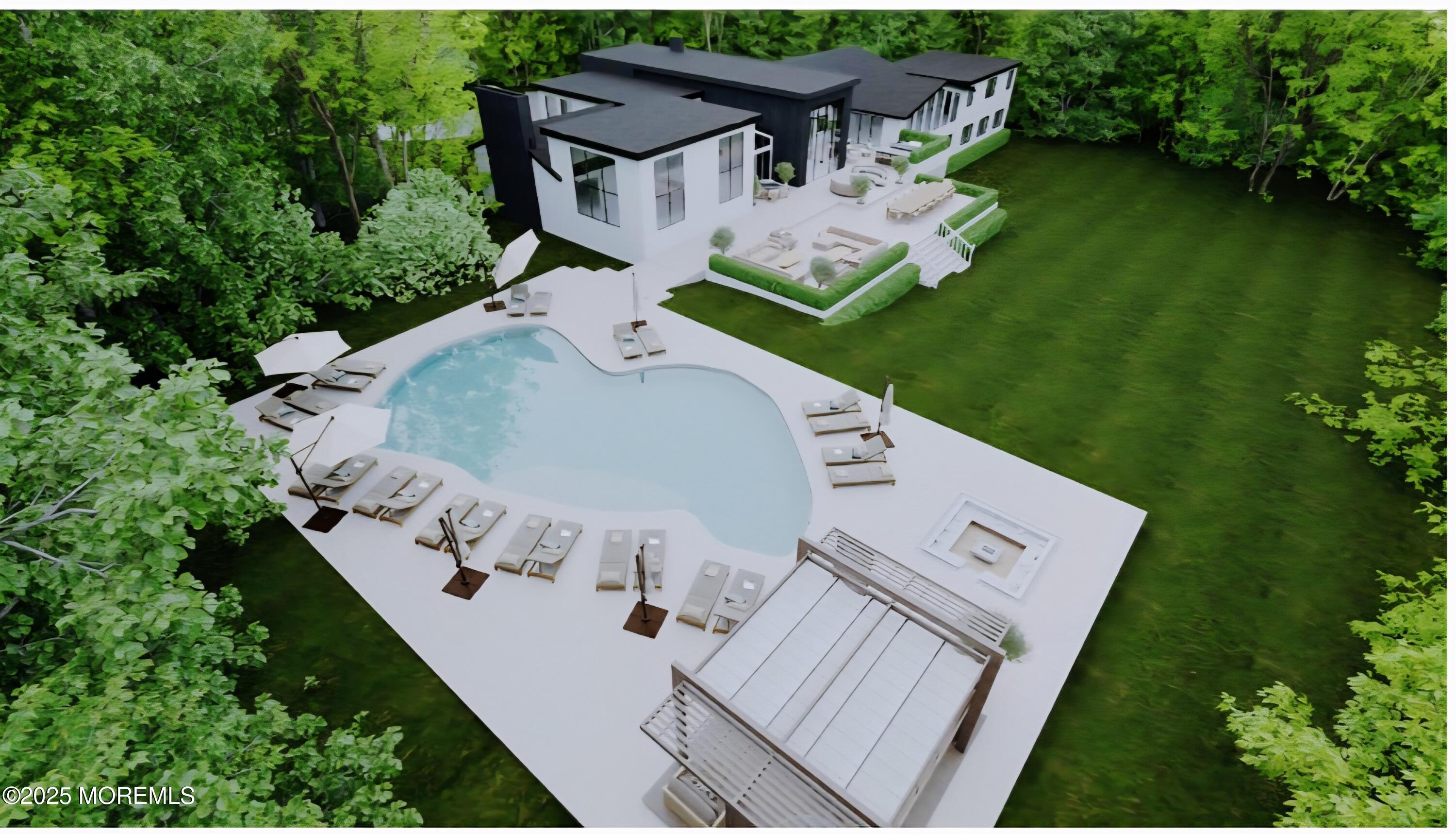 88 Clover Hill Road Colts Neck, NJ 07722 - Photo 6 of 10 an aerial view of a house with outdoor space and trees all around