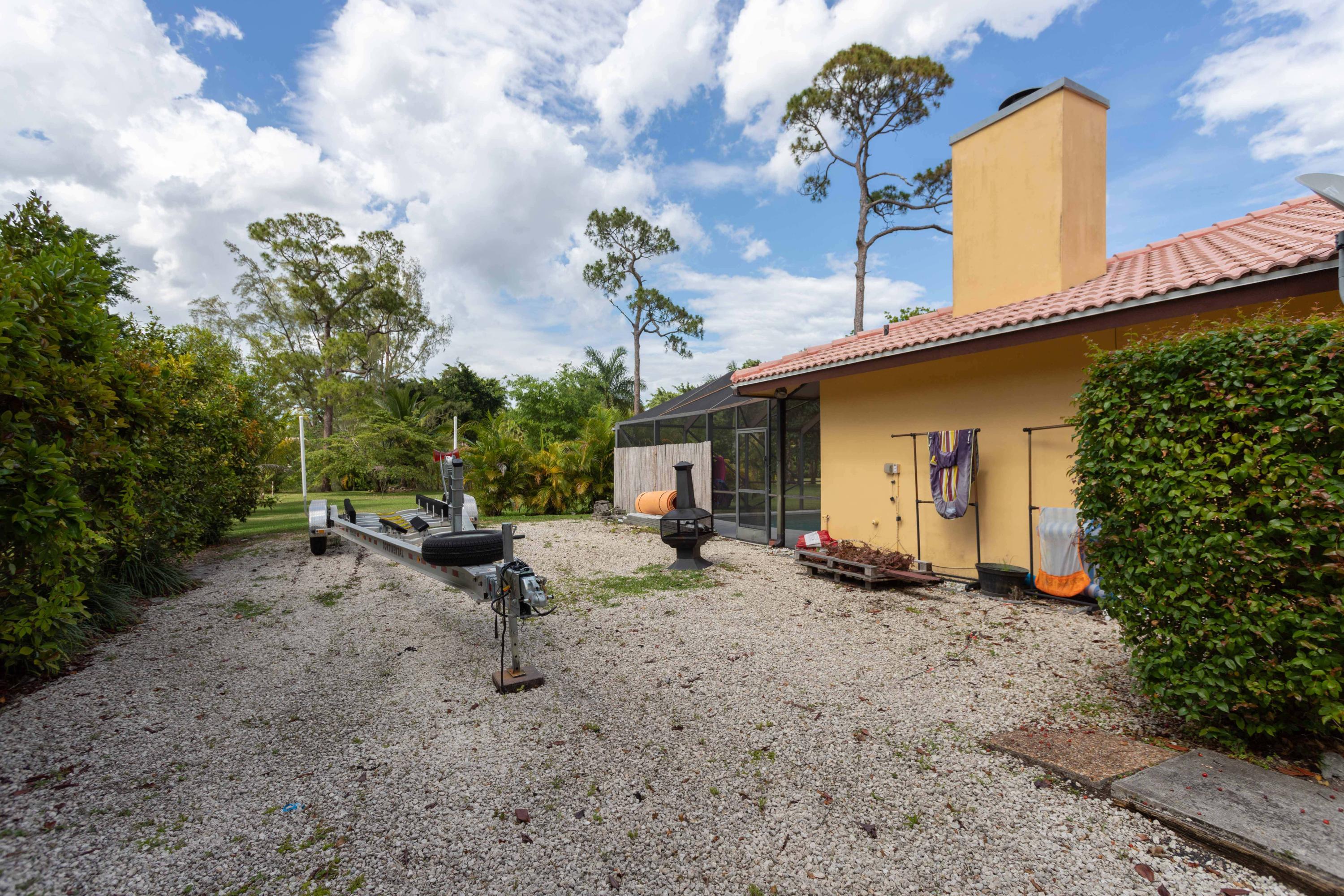 11415 Sundance Lane Boca Raton, FL 33428 - Photo 59 of 63 Fenced Side Yard