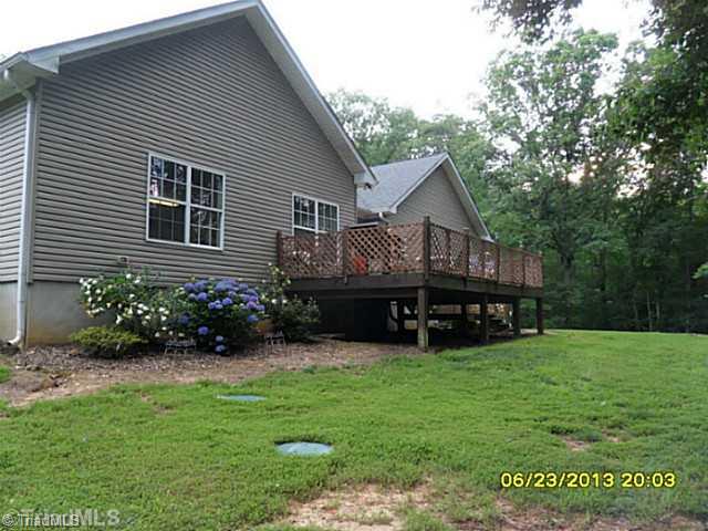 1707 Jones Road King, NC 27021 - Photo 6 of 16 Exterior Back. Beautiful back yard overlooking 6 Acres, Huge deck & more~!