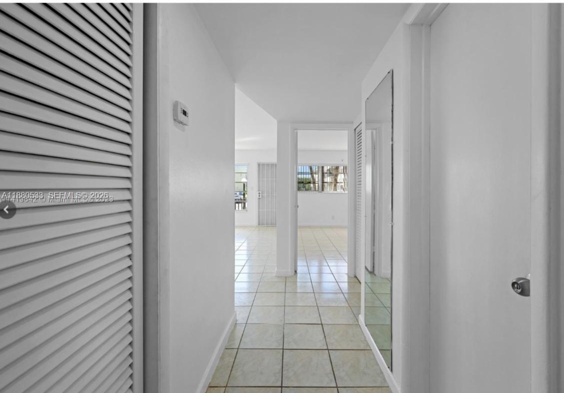 1400 Northeast 169th Street, Unit 115 Miami, FL 33162 - Photo 14 of 15 a view of an entryway