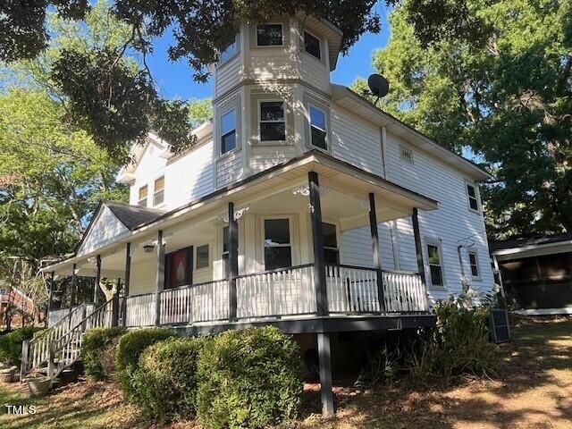 a front view of a house with a balcony