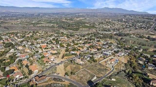an aerial view of residential house and outdoor space
