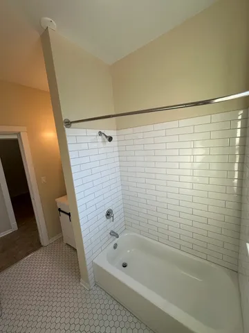 a bathroom with a bathtub