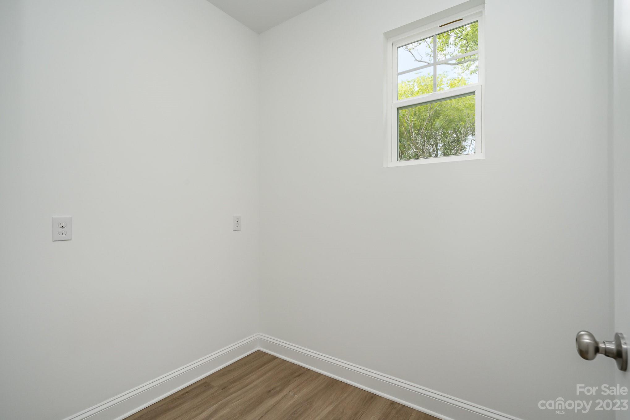 1016 Helms Road Charlotte, NC 28214 - Photo 16 of 39 a view of an empty room and window