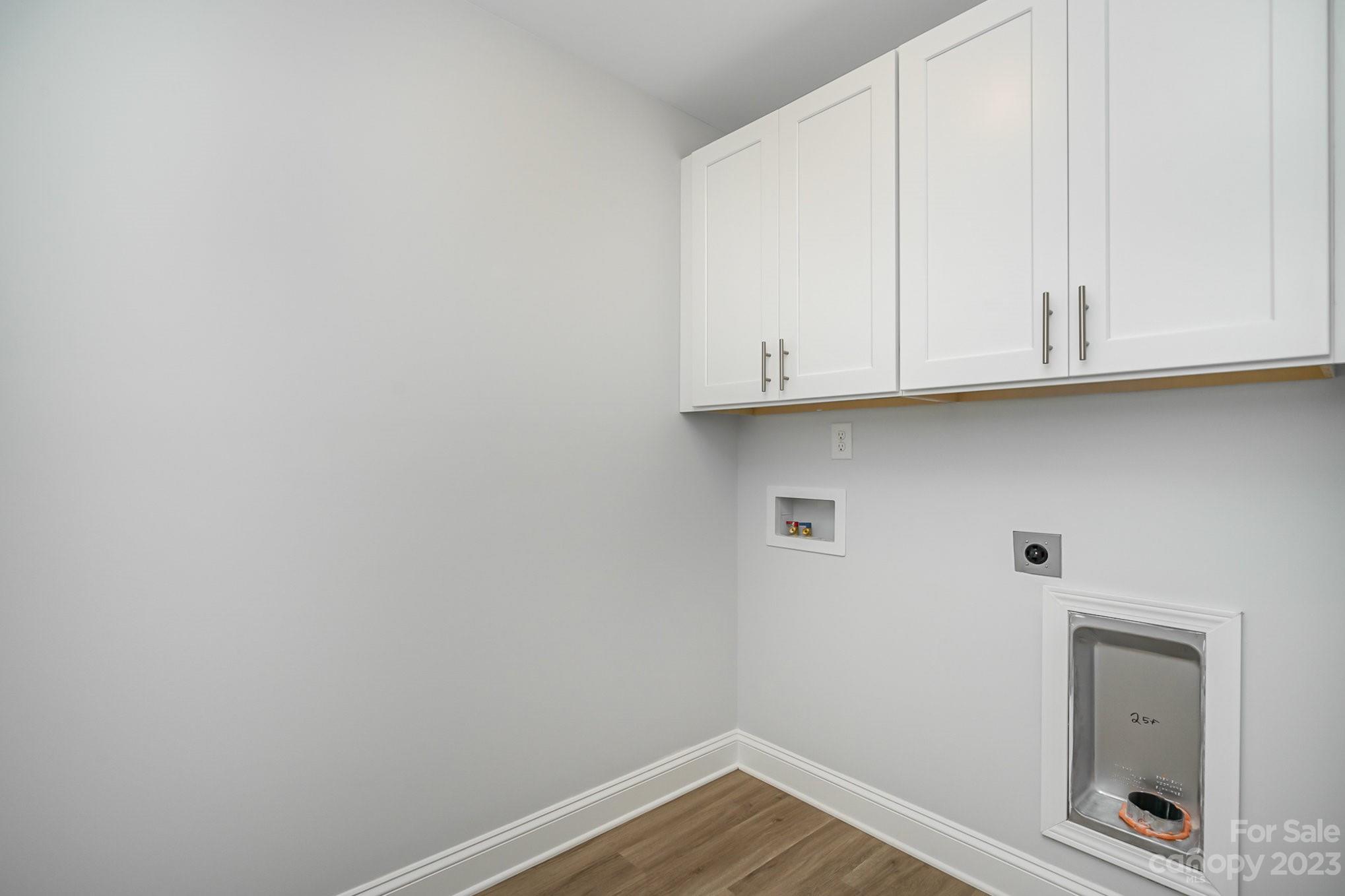 1016 Helms Road Charlotte, NC 28214 - Photo 36 of 39 a view of small space with wooden floor