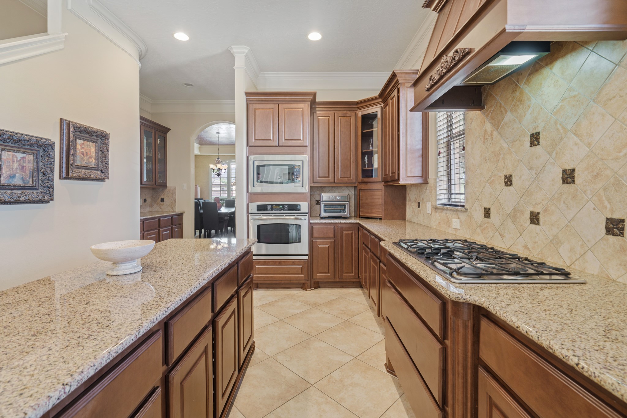 7303 Starry Night Katy, TX 77494 - Photo 24 of 49 Kitchen offers large island as well as a true Butler's Pantry!