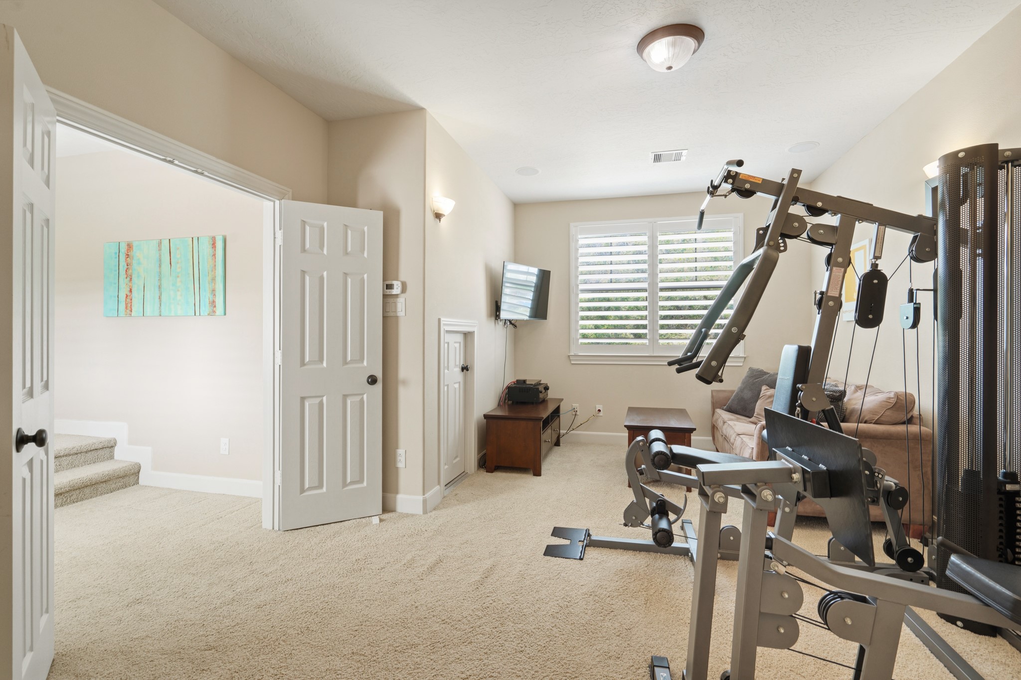 7303 Starry Night Katy, TX 77494 - Photo 37 of 49 Bonus room off the main area of the upstairs - perfect for a 6th bedroom or media/workout room. This is over the porte cochere garage below.