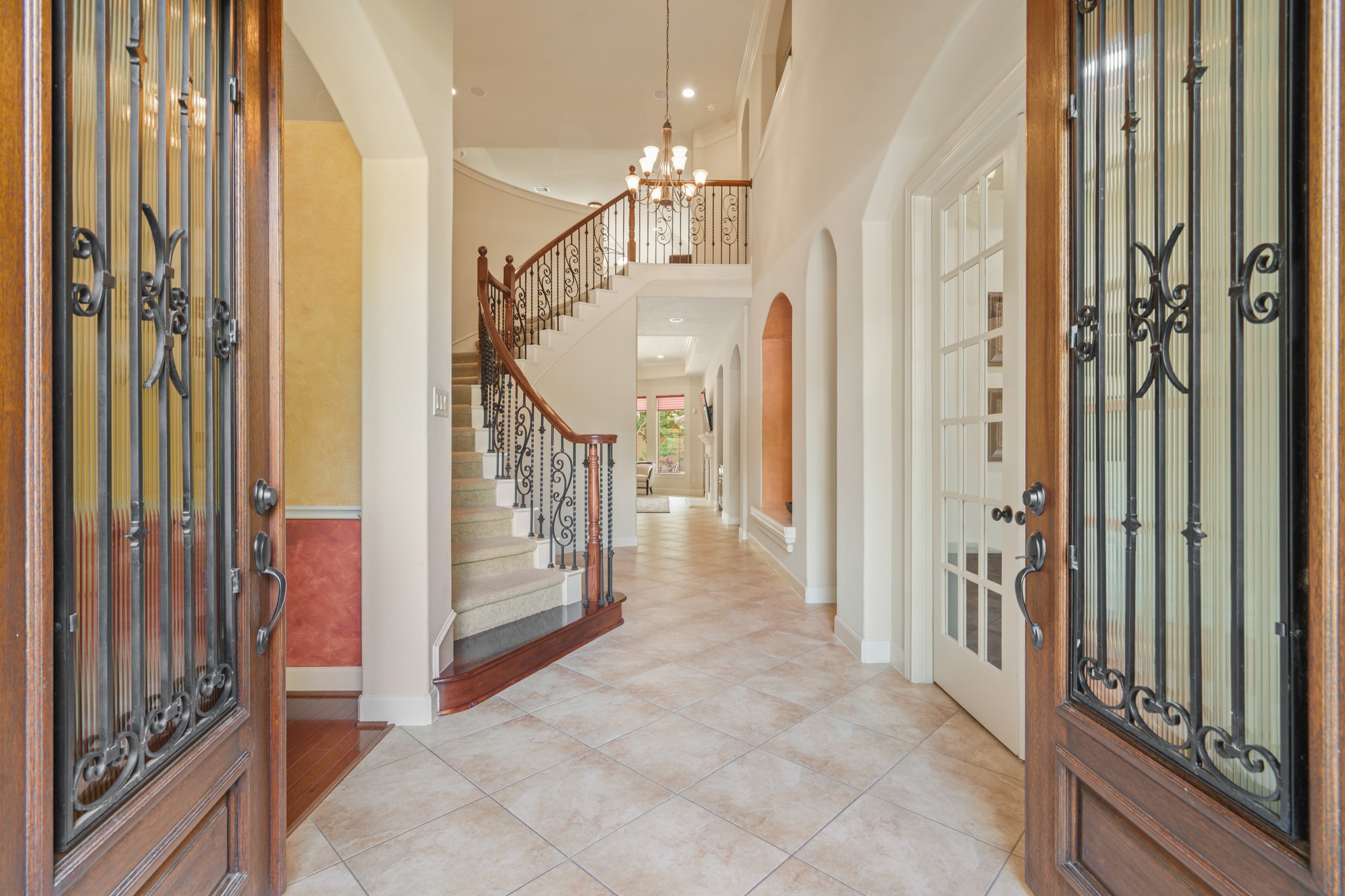 7303 Starry Night Katy, TX 77494 - Photo 4 of 49 When entering this David Powers home, you are drawn into the soaring ceilings of the foyer. Home offers 2 staircases.
