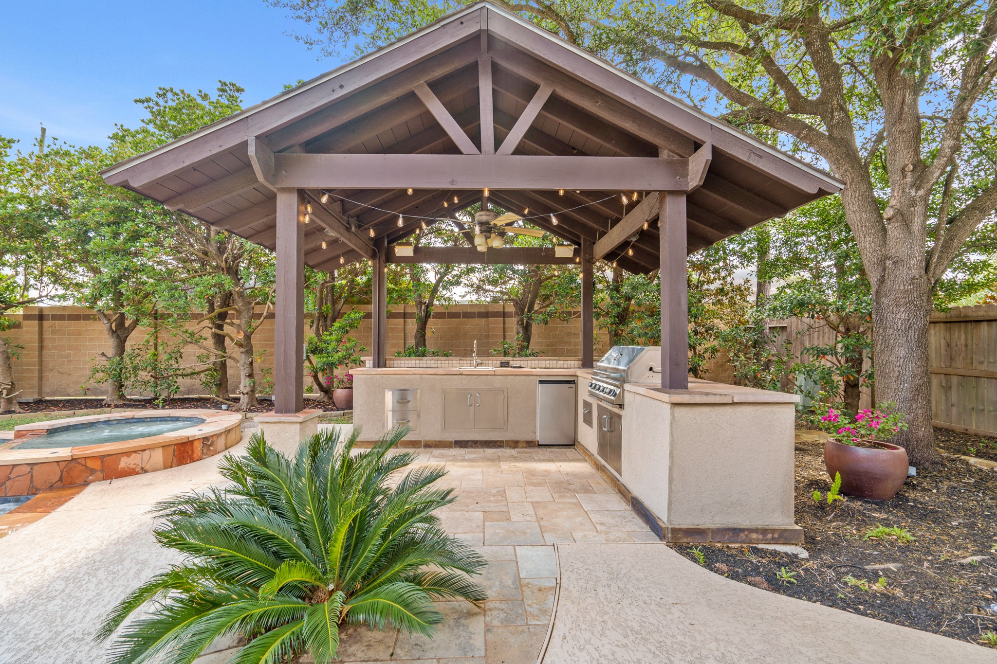 7303 Starry Night Katy, TX 77494 - Photo 42 of 49 Outdoor kitchen complete with everything you need for outdoor entertaining.