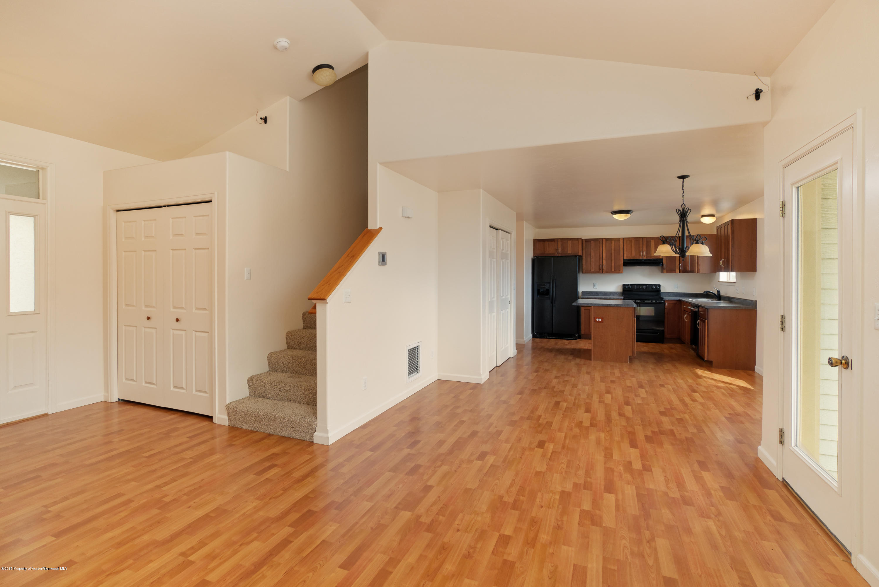 973 East 17th Street Rifle, CO 81650 - Photo 2 of 19 a view of a kitchen with wooden floor