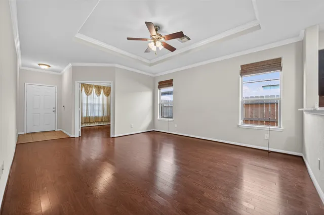 a kitchen with stainless steel appliances granite countertop a refrigerator a sink and a stove