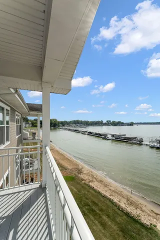 an aerial view of a house with yard swimming pool and outdoor seating