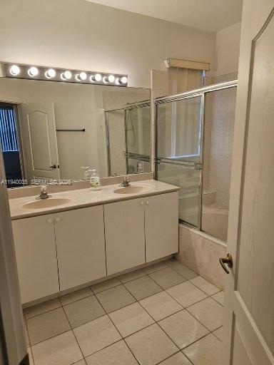 2160 Northeast 37th Road, Unit 2160 Homestead, FL 33033 - Photo 22 of 47 a bathroom with a double vanity sink mirror and shower
