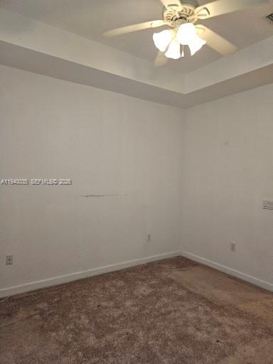 2160 Northeast 37th Road, Unit 2160 Homestead, FL 33033 - Photo 33 of 47 an empty room with a chandelier fan