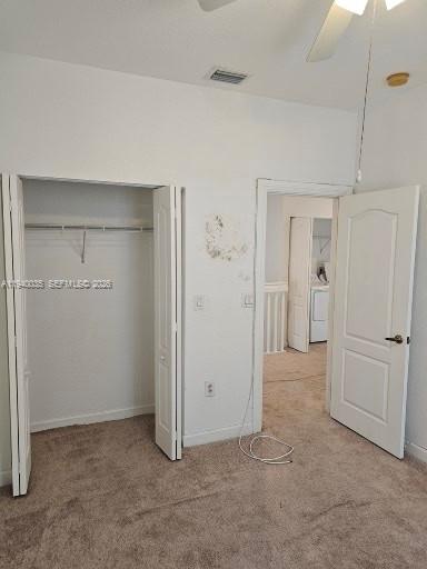 2160 Northeast 37th Road, Unit 2160 Homestead, FL 33033 - Photo 39 of 47 an empty room with a cabinet and mirrors