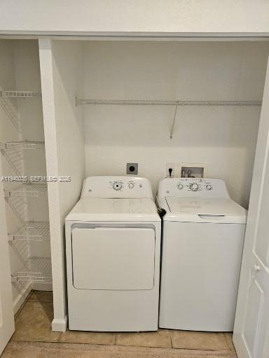 2160 Northeast 37th Road, Unit 2160 Homestead, FL 33033 - Photo 45 of 47 a utility room with dryer and washer