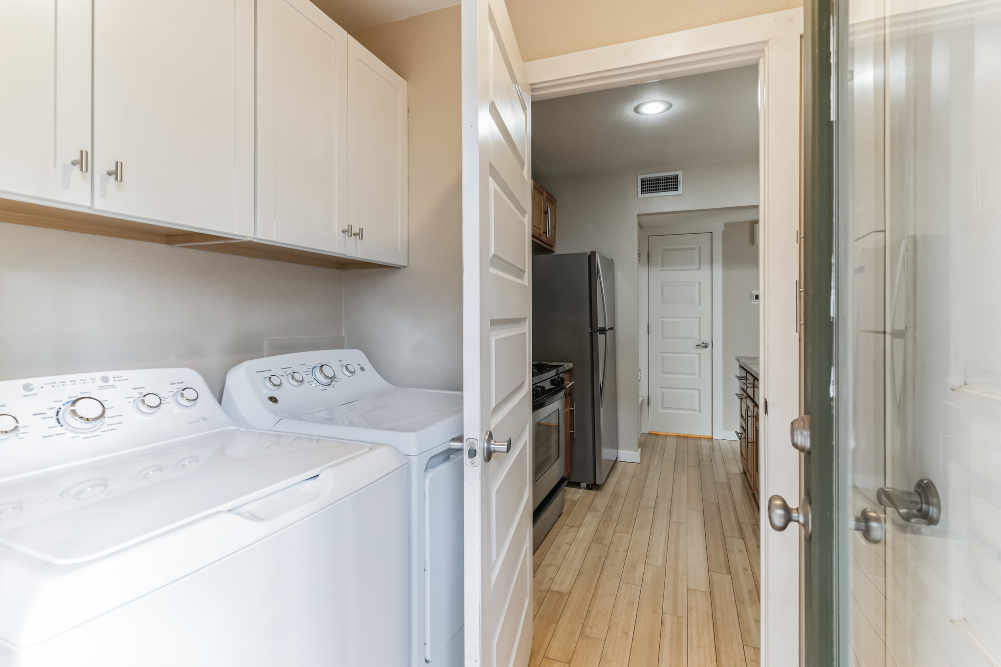 3214 Clawson Road, Unit A Austin, TX 78704 - Photo 19 of 26 Functional laundry facilities integrate seamlessly with nearby kitchen space, offering both convenience and utility.