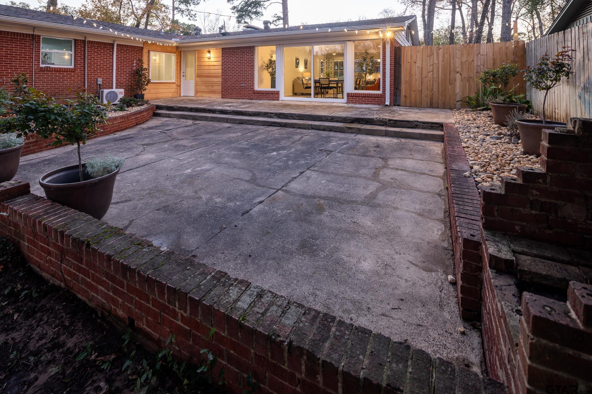 3518 Bain Place Tyler, TX 75701 - Photo 34 of 44 a front view of a house with a yard