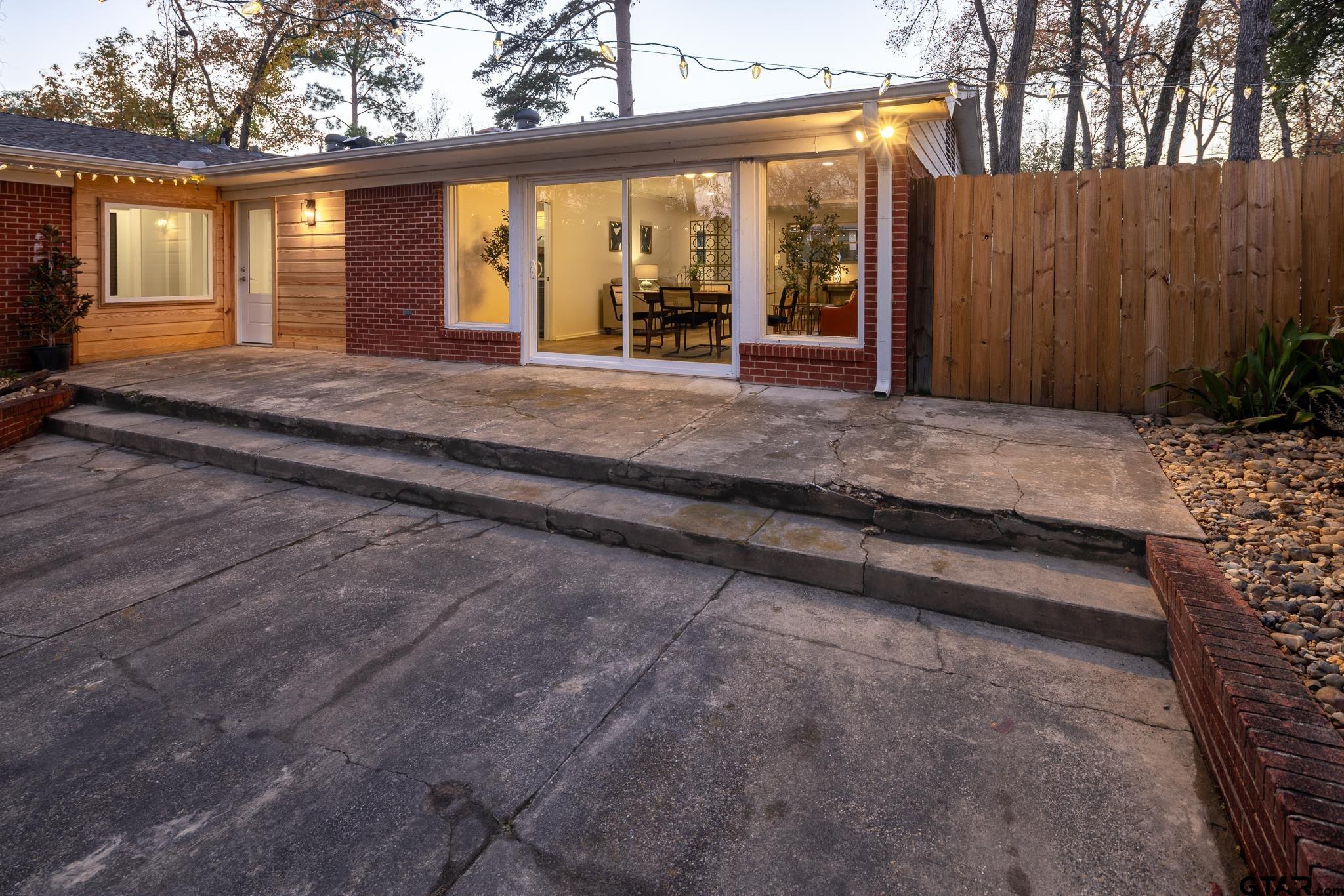 3518 Bain Place Tyler, TX 75701 - Photo 35 of 44 a view of a house with a porch and furniture
