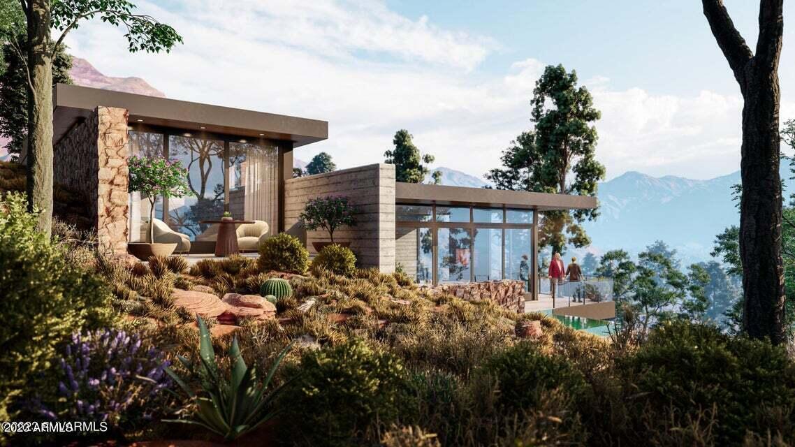 7 Sky Ridge Sedona, AZ 86336 - Photo 16 of 17 a view of a house with a small yard and floor to ceiling window