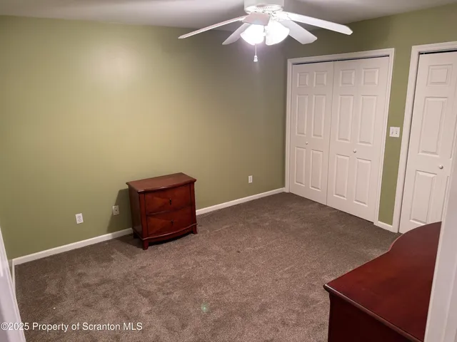 an empty room and a lamp