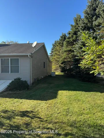 a view of pool with back yard