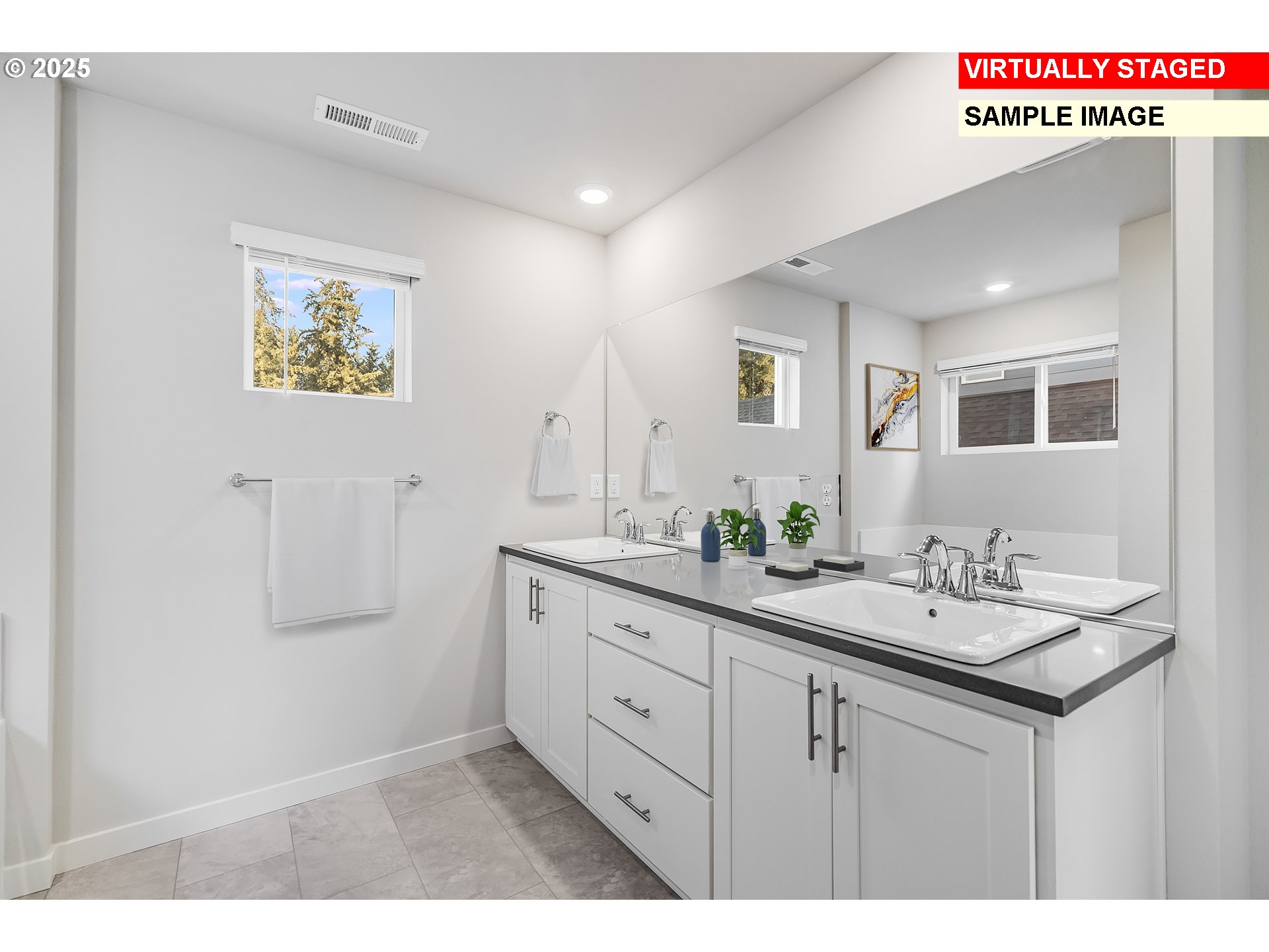 843 Glade Avenue, Unit H162 Forest Grove, OR 97116 - Photo 16 of 28 a bathroom with a sink a mirror a vanity and a shower