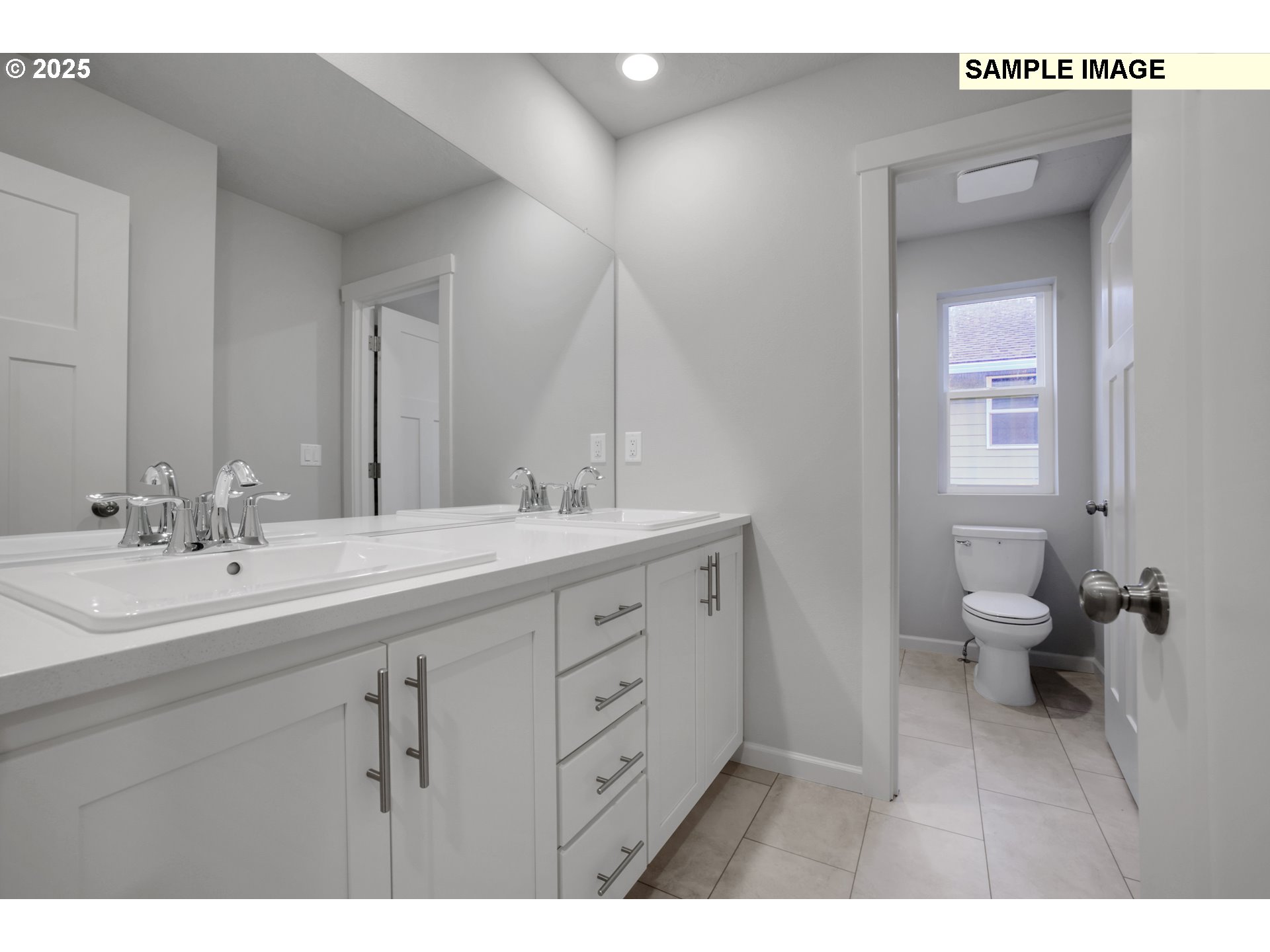 843 Glade Avenue, Unit H162 Forest Grove, OR 97116 - Photo 24 of 28 a bathroom with a double vanity sink mirror and toilet