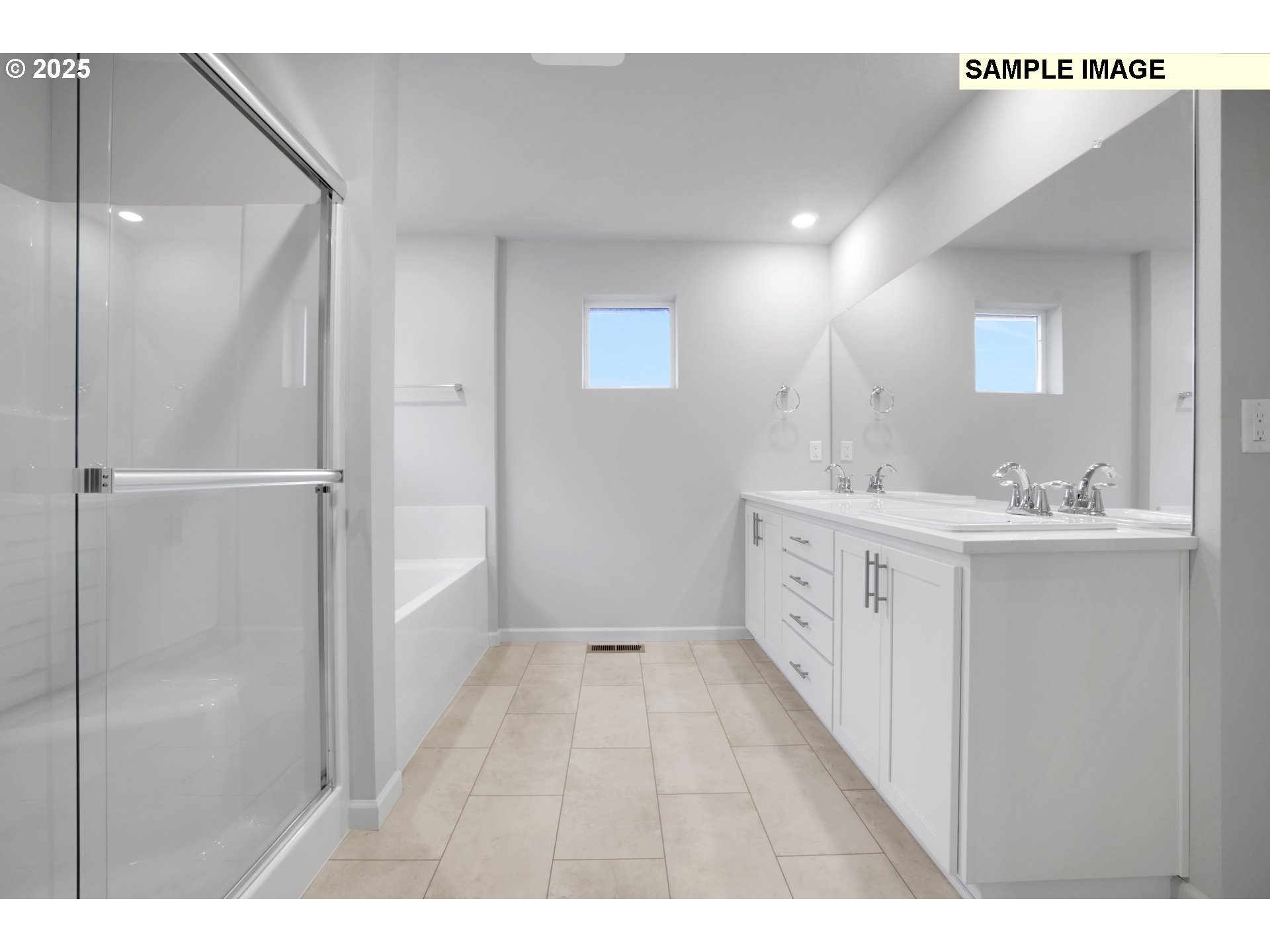 843 Glade Avenue, Unit H162 Forest Grove, OR 97116 - Photo 25 of 28 a bathroom with a double vanity sink a mirror and a shower