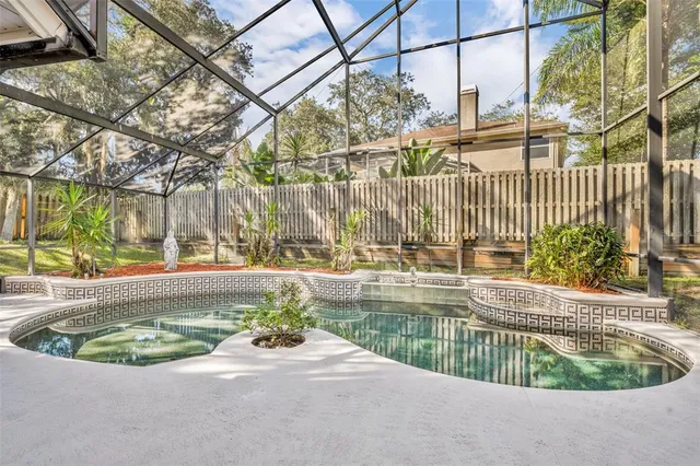 a view of a chandelier in big room and a chandelier fan