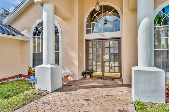 a front view of a house with outdoor space