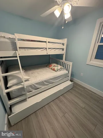 a bathroom with a sink a mirror and vanity