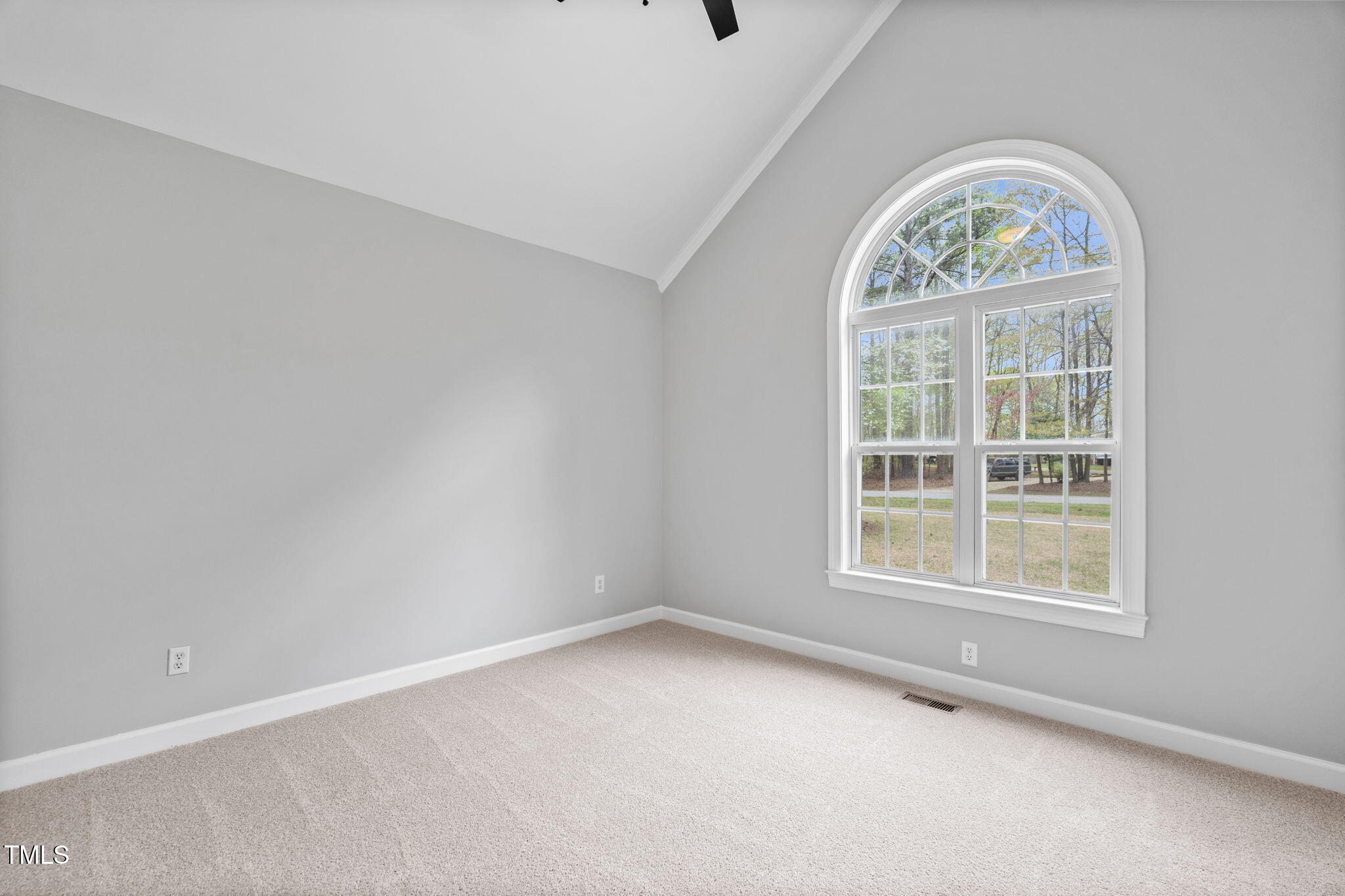 340 Castleberry Road Clayton, NC 27527 - Photo 20 of 31 an empty room with a window