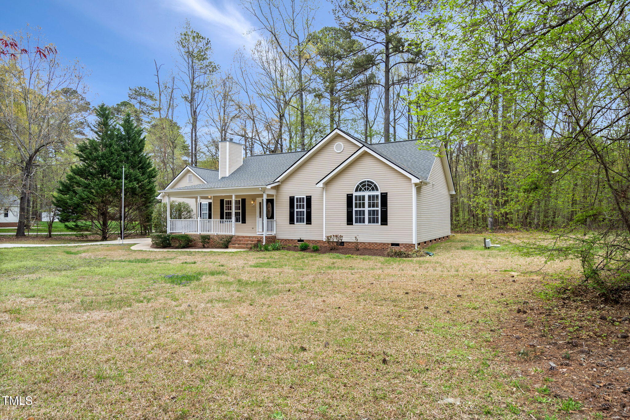 340 Castleberry Road Clayton, NC 27527 - Photo 3 of 31 a view of a house with a yard