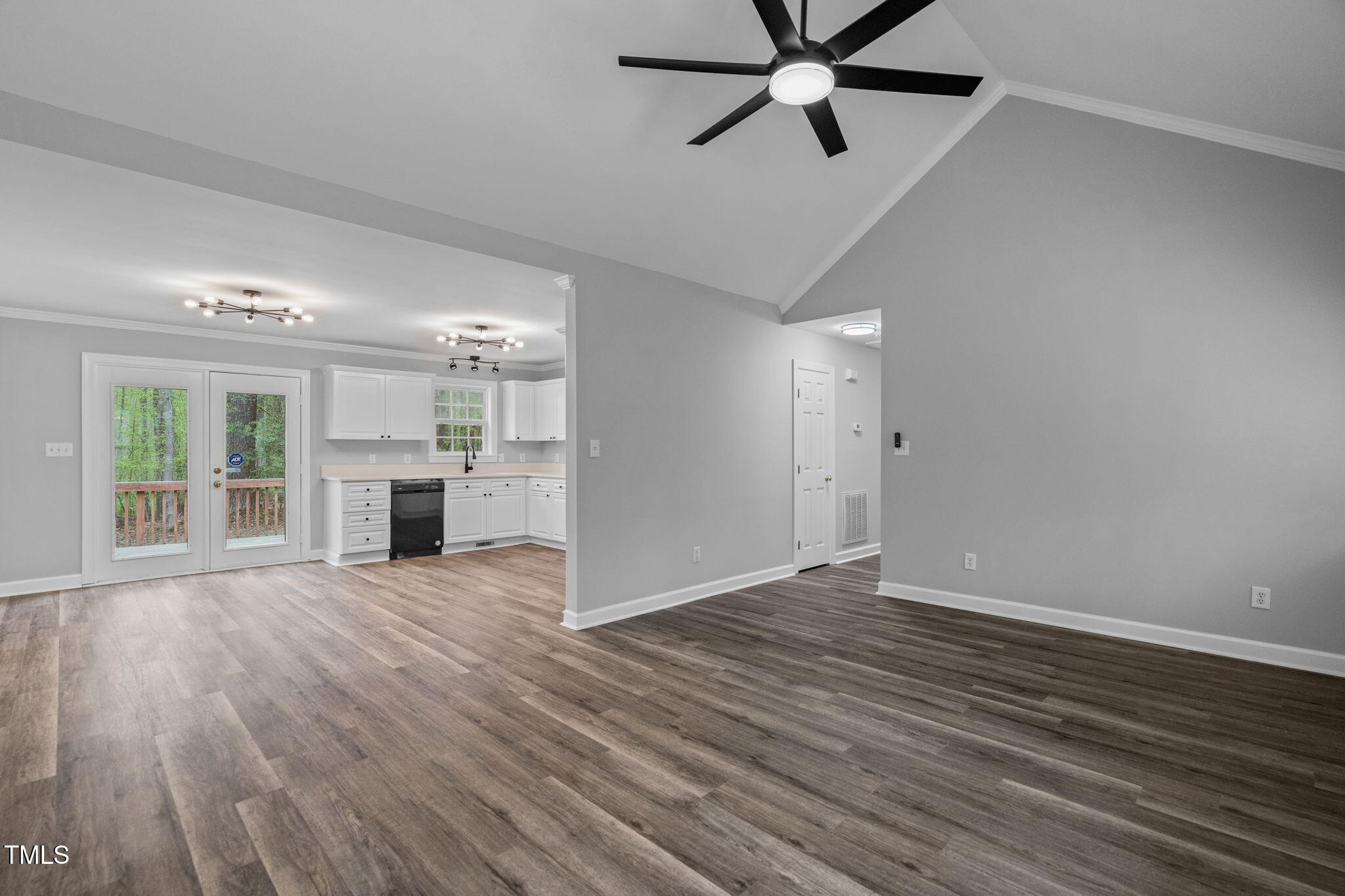 340 Castleberry Road Clayton, NC 27527 - Photo 7 of 31 wooden floor in an empty room with a window