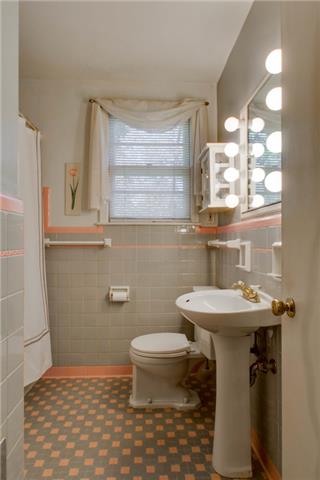 636 Hogan Road Nashville, TN 37220 - Photo 11 of 14 Original tilework in GREAT condition sets the stage in this full bath!
