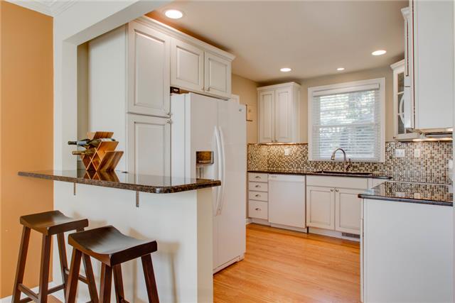 636 Hogan Road Nashville, TN 37220 - Photo 5 of 14 Want a renovated kitchen? Here you go! Gutted to the studs in 2010- all new cabinets, lighting, granite, appliances and the addition of the bar top. Awesome!
