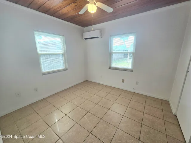 a view of a room that has a window in it